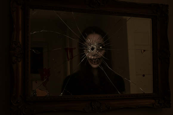Haunted Mirror Horror Background: A Designer's Portal to the Paranormal